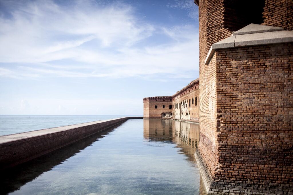 Fort Jefferson is a massive but unfinished coastal fortress. It is the largest masonry structure in the Americas, and is composed of over 16 million bricks.